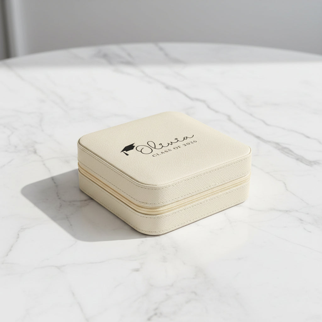 Beige pouch with 'Olivia Class of 2026' text and graduation cap icon on a white background